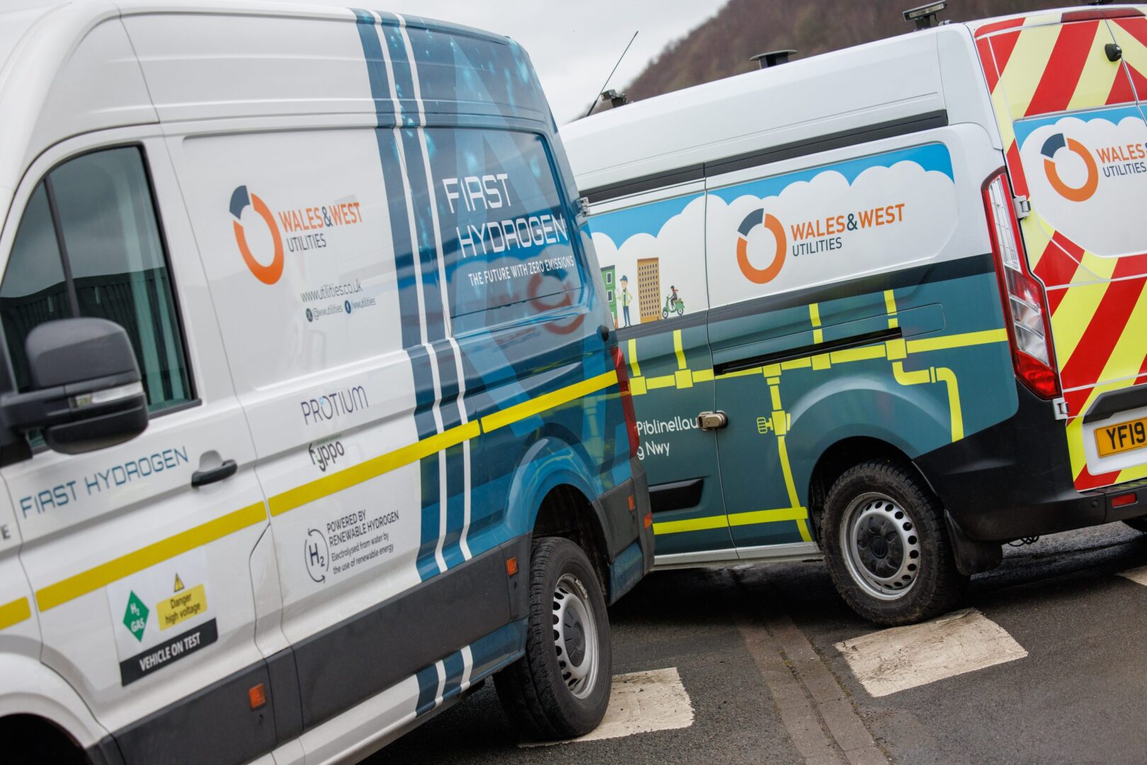 First Hydrogen and Wales & West Utilities hydrogen-powered vehicles lined up during green hydrogen vehicle trials launch.